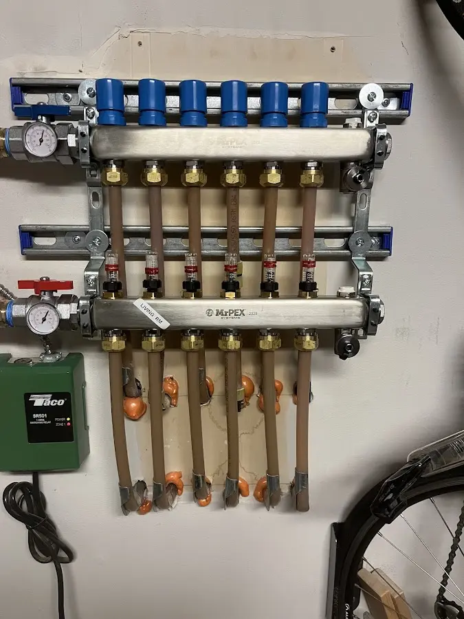 Plumber performing Water Heater Repair at a residential property in Candor